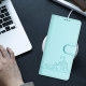 For Samsung Galax S24+ 5G Cat Rat Embossed Pattern RFID PU Phone Case with Wrist Strap(Mint Green)