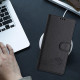 For Samsung Galax S24+ 5G Cat Rat Embossed Pattern RFID PU Phone Case with Wrist Strap(Black)
