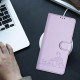 For Samsung Galax S24+ 5G Cat Rat Embossed Pattern RFID PU Phone Case with Wrist Strap(Purple)
