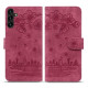 For Samsung Galaxy S24+ 5G Cartoon Sakura Cat Embossed Leather Phone Case(Wine Red)