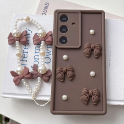 For Samsung Galaxy S24+ 5G Soft Silicone 3D Bowknot Pearl Phone Case with Beaded Wrist Strap(Coffee)