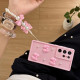 For Samsung Galaxy S24+ 5G Soft Silicone 3D Bowknot Pearl Phone Case with Beaded Wrist Strap(Coffee)